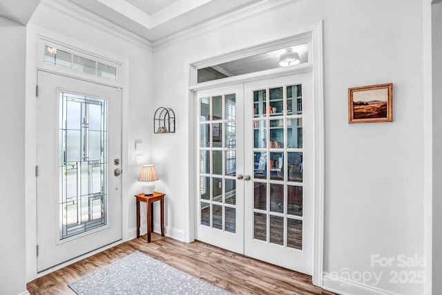 10509 Serape Rd, Charlotte, NC 28277 - foyer featuring french doors, wood finished floors, and ornamental molding