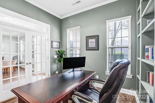 10509 Serape Rd, Charlotte, NC 28277 - office area with french doors, healthy amount of natural light, crown molding, and wood finished floors