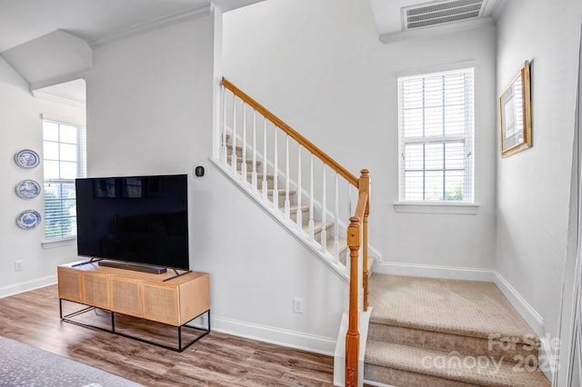 10509 Serape Rd, Charlotte, NC 28277 - stairs with crown molding and wood finished floors