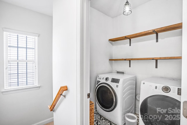 10509 Serape Rd, Charlotte, NC 28277 - washroom with washing machine and dryer and baseboards