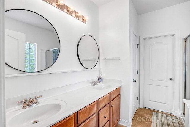 10509 Serape Rd, Charlotte, NC 28277 - full bathroom featuring double vanity, tile patterned flooring, and a shower with door