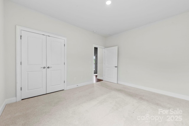 1300 Dali Blvd, Mount Holly, NC 28120 - unfurnished bedroom featuring carpet, a closet, and recessed lighting