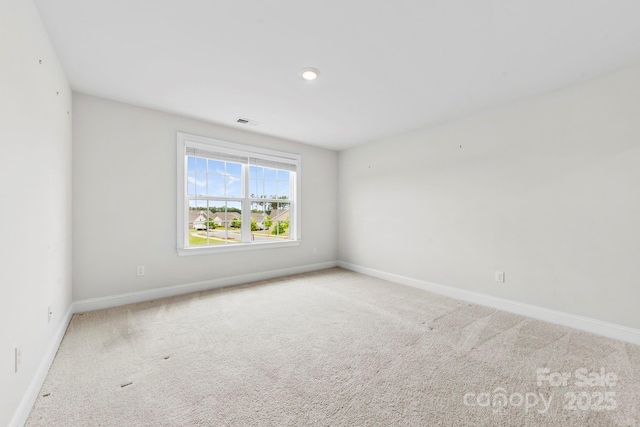 1300 Dali Blvd, Mount Holly, NC 28120 - carpeted spare room featuring baseboards
