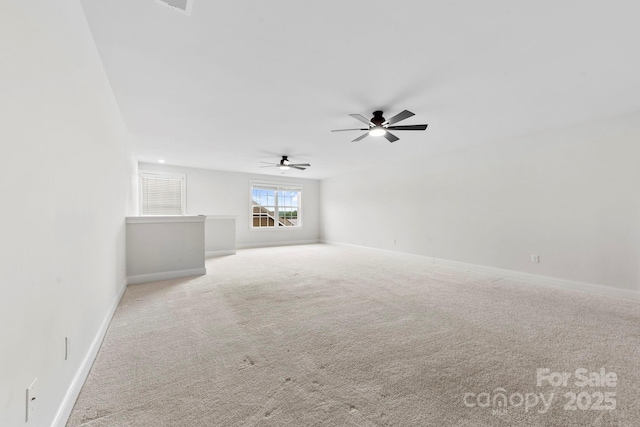 1300 Dali Blvd, Mount Holly, NC 28120 - unfurnished living room featuring a ceiling fan and carpet flooring