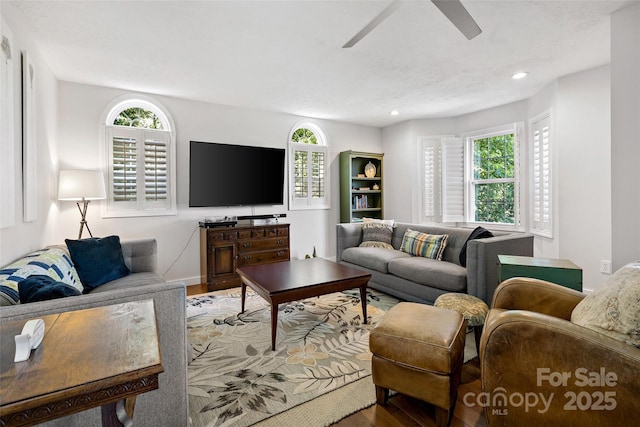1181 Forest Lake Heights Dr, Nebo, NC 28761 - living room featuring wood finished floors, plenty of natural light, ceiling fan, and recessed lighting