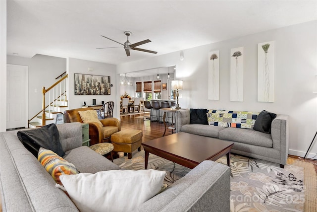 1181 Forest Lake Heights Dr, Nebo, NC 28761 - living area with wood finished floors, a ceiling fan, and stairs
