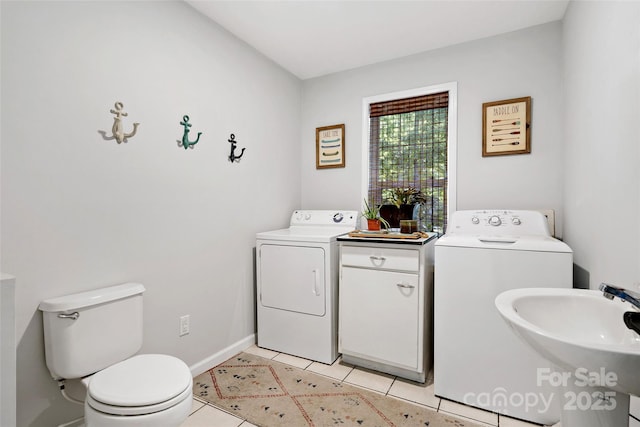 1181 Forest Lake Heights Dr, Nebo, NC 28761 - bathroom with washer and clothes dryer and tile patterned flooring