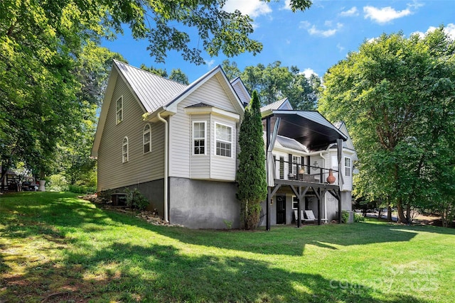 1181 Forest Lake Heights Dr, Nebo, NC 28761 - view of front of home with a front yard, a deck, and a metal roof