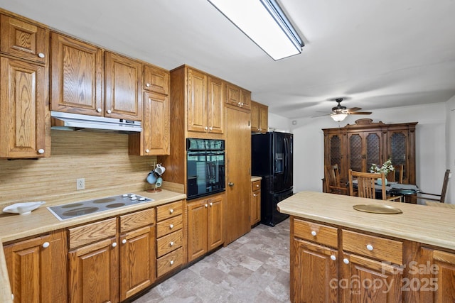 100 Nimitz Dr, Brevard, NC 28712 - kitchen with black appliances, light countertops, and ceiling fan