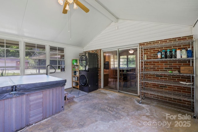 100 Nimitz Dr, Brevard, NC 28712 - sunroom featuring a jacuzzi, a ceiling fan, and stacked washer / drying machine