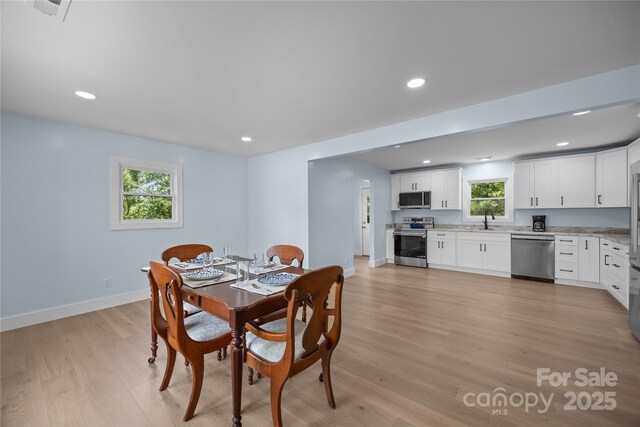 221 John C Logan Rd, Rutherfordton, NC 28139 - dining space with light wood-type flooring and recessed lighting