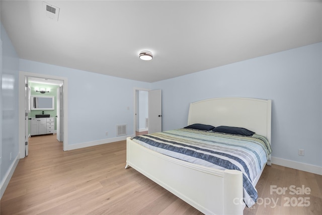 221 John C Logan Rd, Rutherfordton, NC 28139 - bedroom featuring light wood-style flooring and baseboards