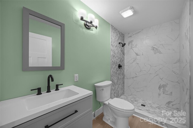 221 John C Logan Rd, Rutherfordton, NC 28139 - full bath featuring a stall shower, vanity, and wood finished floors