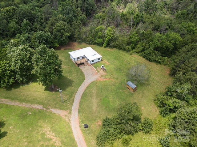 221 John C Logan Rd, Rutherfordton, NC 28139 - view of property location with a heavily wooded area