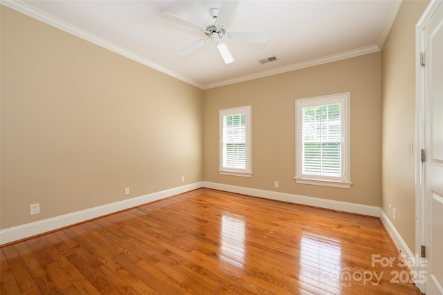 6312 Mission Pl, Charlotte, NC 28210 - empty room featuring light wood-style flooring, crown molding, and a ceiling fan
