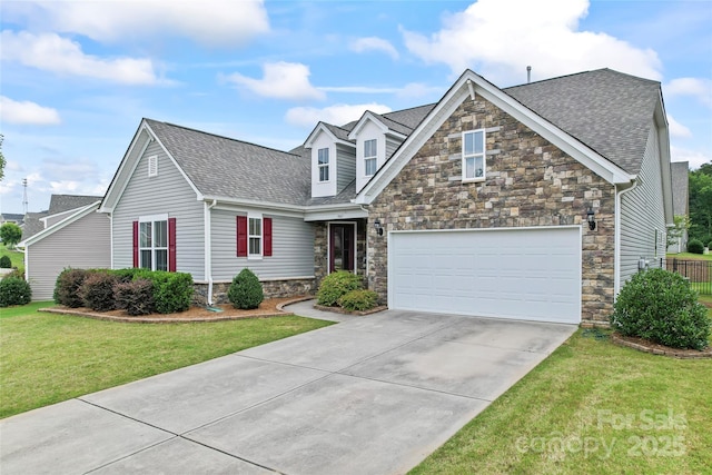 9547 Horsebit Ln, Concord, NC 28027 - view of front of property with stone siding, roof with shingles, concrete driveway, a front lawn, and a garage