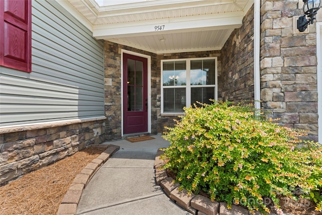 9547 Horsebit Ln, Concord, NC 28027 - doorway to property with stone siding