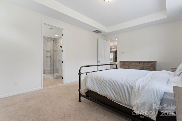 9547 Horsebit Ln, Concord, NC 28027 - bedroom with light carpet, ensuite bathroom, and a raised ceiling