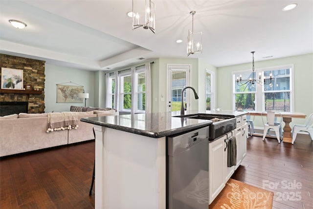 9547 Horsebit Ln, Concord, NC 28027 - kitchen with stainless steel dishwasher, a chandelier, open floor plan, dark wood-type flooring, and plenty of natural light