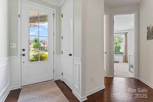 9547 Horsebit Ln, Concord, NC 28027 - entryway featuring wainscoting and dark wood-style floors