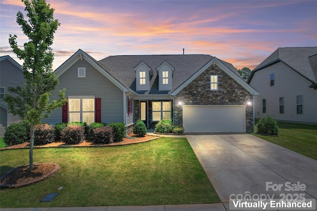 9547 Horsebit Ln, Concord, NC 28027 - view of front of home with stone siding, driveway, a front lawn, and a garage