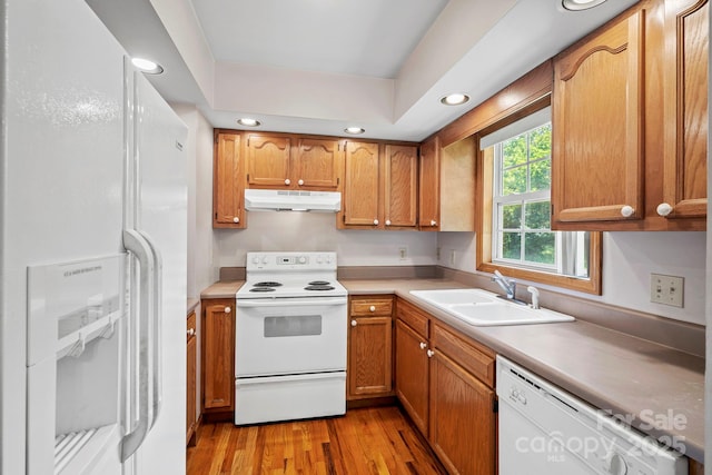 55 Wyatt St, Asheville, NC 28803 - kitchen featuring white appliances, under cabinet range hood, light wood finished floors, recessed lighting, and light countertops
