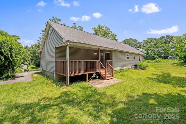 55 Wyatt St, Asheville, NC 28803 - rear view of house with a lawn and a wooden deck