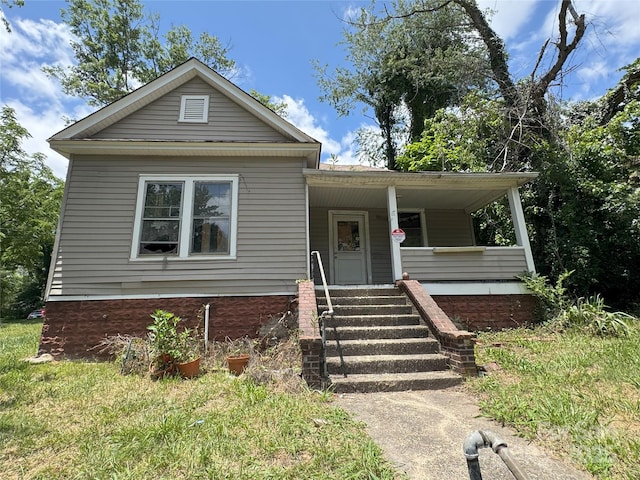 21 Allen St, Asheville, NC 28806 - view of front of home with covered porch