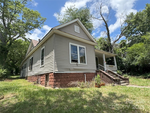 21 Allen St, Asheville, NC 28806 - view of front of home with stairway, a front yard, and a porch