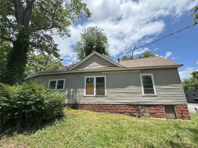 21 Allen St, Asheville, NC 28806 - view of side of property with a lawn