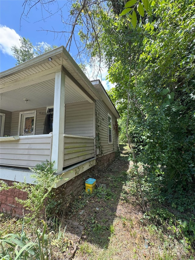 21 Allen St, Asheville, NC 28806 - view of side of home with covered porch