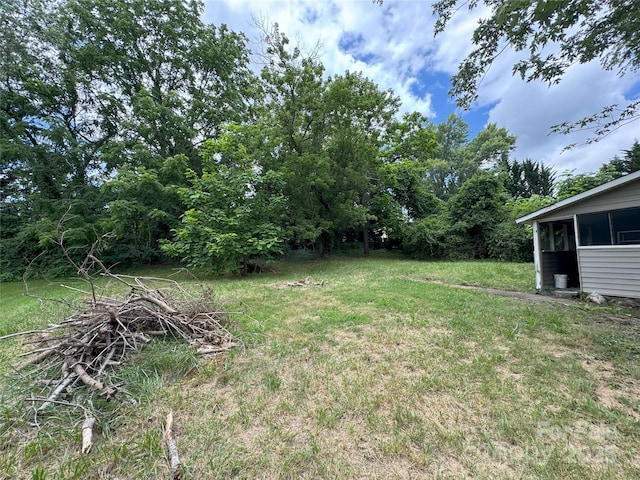 21 Allen St, Asheville, NC 28806 - view of green lawn featuring a sunroom