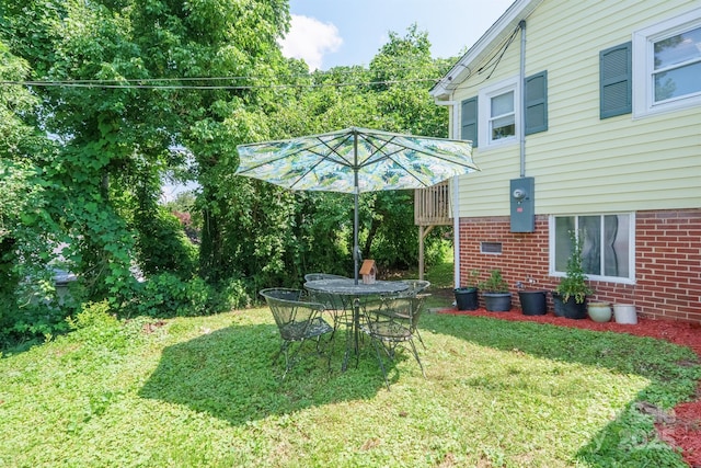 576 Washington Ave NW, Valdese, NC 28690 - view of grassy yard with outdoor dining space