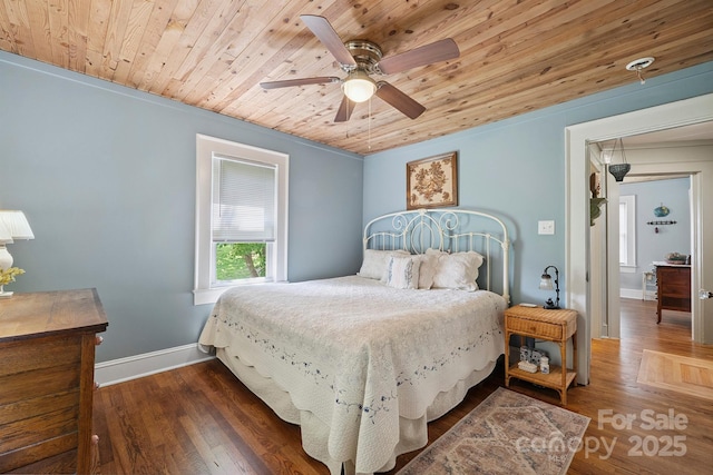 576 Washington Ave NW, Valdese, NC 28690 - bedroom featuring wooden ceiling, wood finished floors, and a ceiling fan