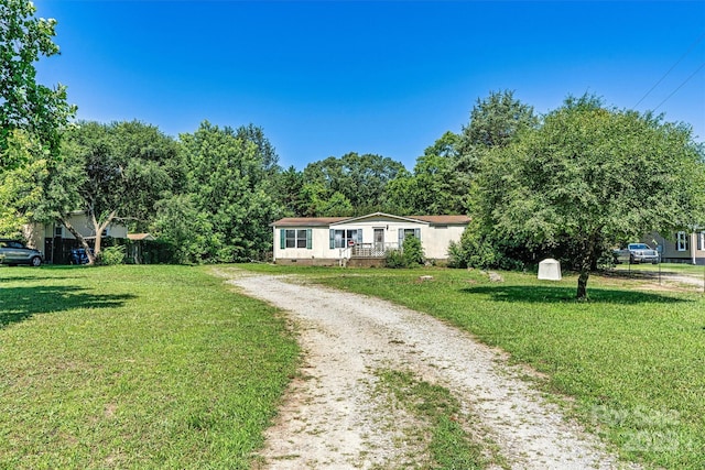 4905 Grassy Creek Rd, Denver, NC 28037 - ranch-style house featuring a front lawn and driveway