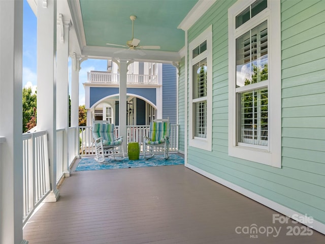 8918 Cotton Press Rd, Charlotte, NC 28277 - unfurnished sunroom featuring a ceiling fan, crown molding, and plenty of natural light