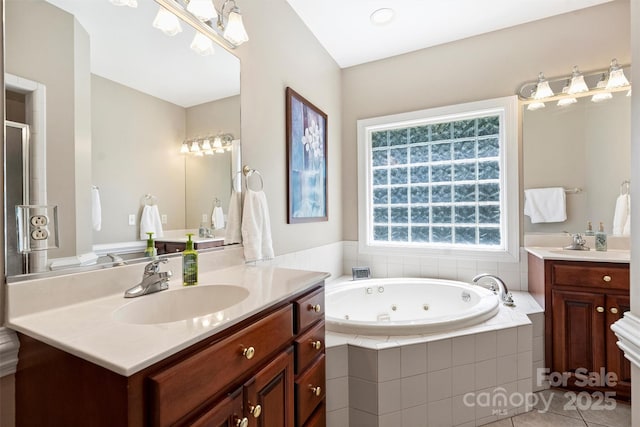 6309 Chamar Cir, Kannapolis, NC 28081 - full bathroom featuring vanity, a jetted tub, tile patterned floors, and a shower stall