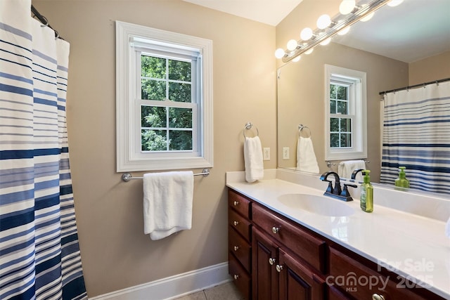 6309 Chamar Cir, Kannapolis, NC 28081 - full bathroom featuring vanity, healthy amount of natural light, tile patterned floors, and a shower with shower curtain