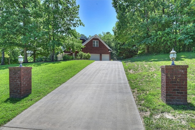 6309 Chamar Cir, Kannapolis, NC 28081 - view of front of property featuring a front lawn, a garage, and driveway