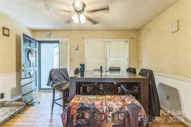 1713 Poe Cir, Hickory, NC 28601 - dining space with ceiling fan, a textured ceiling, and wood finished floors
