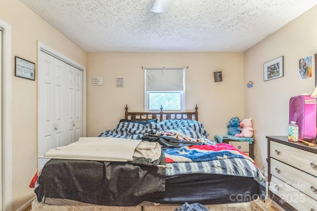 1713 Poe Cir, Hickory, NC 28601 - bedroom featuring a closet and a textured ceiling