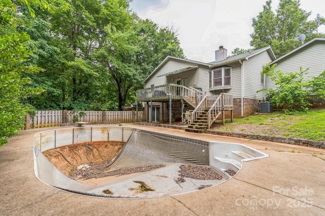 1713 Poe Cir, Hickory, NC 28601 - view of swimming pool with stairs, a fenced backyard, a deck, and a diving board
