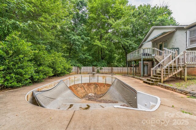 1713 Poe Cir, Hickory, NC 28601 - view of swimming pool with a wooden deck and stairs