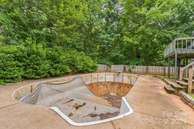 1713 Poe Cir, Hickory, NC 28601 - view of pool featuring a fenced backyard and stairway