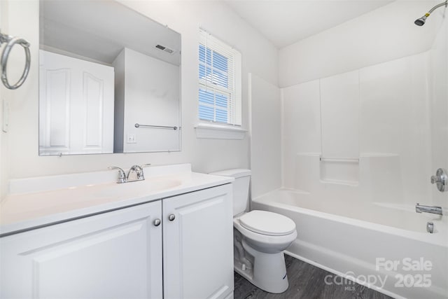 5233 Halverson Ct, Kannapolis, NC 28083 - bathroom featuring vanity, bathtub / shower combination, and wood finished floors