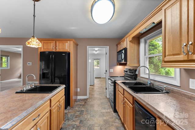 435 Pauline Ave, Franklin, NC 28734 - kitchen with black appliances, healthy amount of natural light, and light countertops