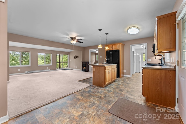 435 Pauline Ave, Franklin, NC 28734 - kitchen featuring a baseboard radiator, open floor plan, black fridge with ice dispenser, stone finish flooring, and carpet flooring