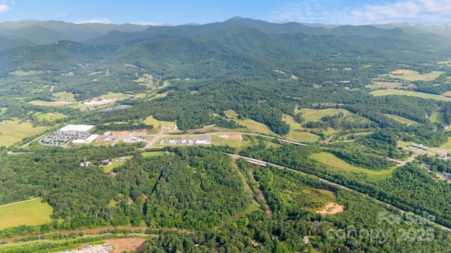 435 Pauline Ave, Franklin, NC 28734 - aerial view of property and surrounding area with a heavily wooded area