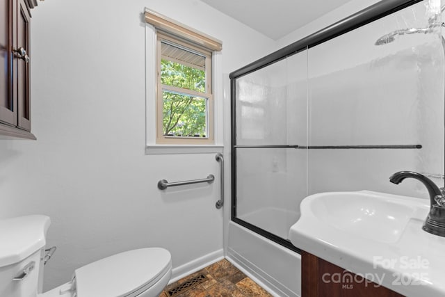 435 Pauline Ave, Franklin, NC 28734 - bathroom with bath / shower combo with glass door, vanity, and stone finish flooring
