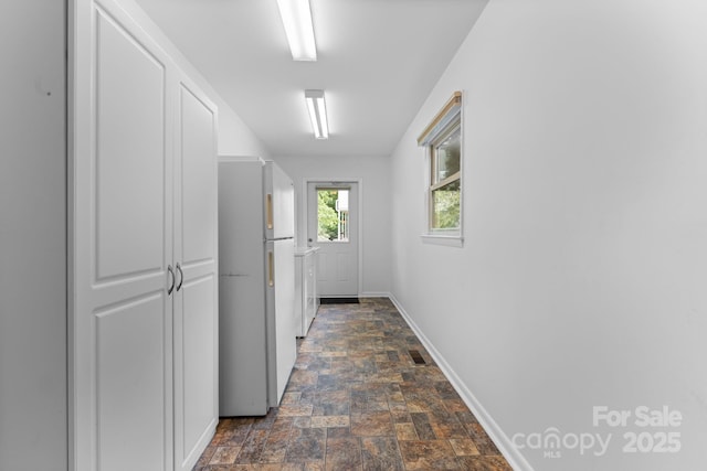 435 Pauline Ave, Franklin, NC 28734 - washroom featuring stone finish flooring and washing machine and dryer
